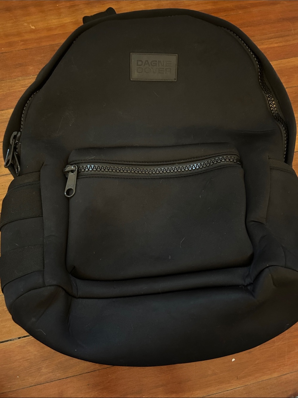 Dagne Dover Black Neoprene Backpack with Front Zip Pocket